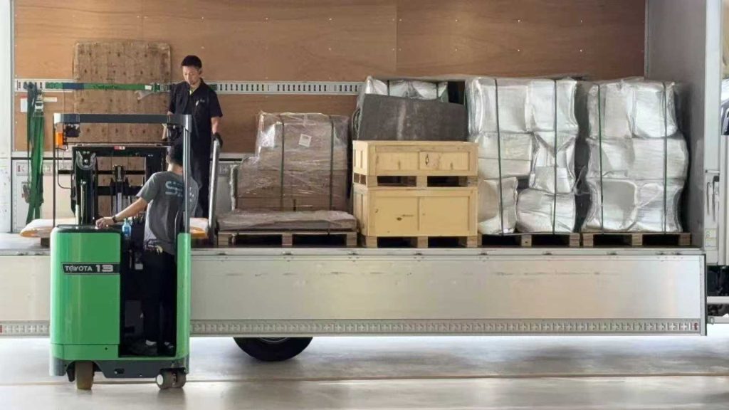 AllDaigou China warehouse: forklift loading packed cargo